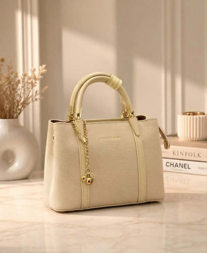 Sac à main Alexander avec breloque cerise dorée